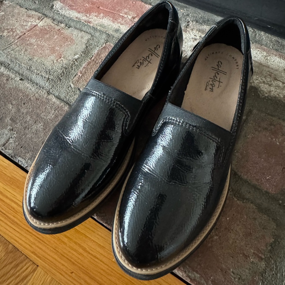 Clarks Black Patent Leather Slip-On Loafers with Tan Trim